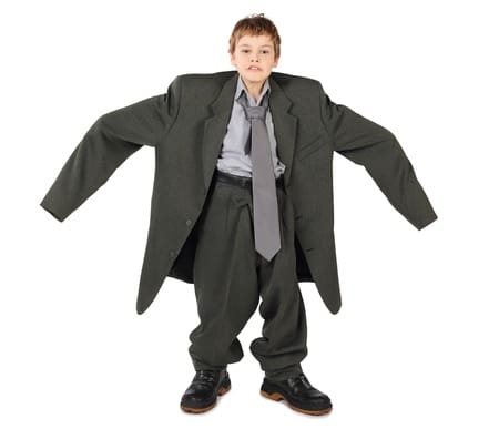 Boy in a big suit